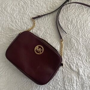 Michael kors crossbody maroon in perfect condition